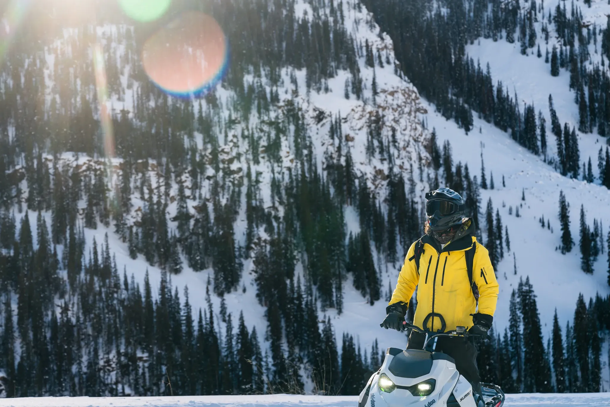 Guided Vail Snow Coach Tour ascending to 12,500 feet with panoramic views of the Colorado Rockies.
